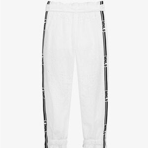 NWT! Monnalisa girls white cotton eyelet trousers. Logos down the side. Size 8.